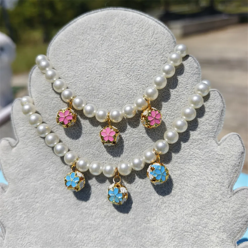 Collier de perles avec cloches - Pet Supplies York avis et prix