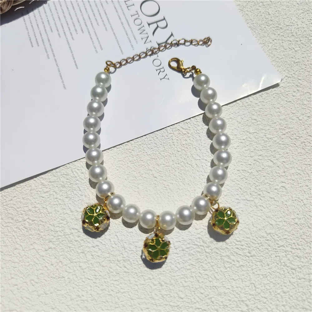 Collier de perles avec cloches - Pet Supplies York avis et prix