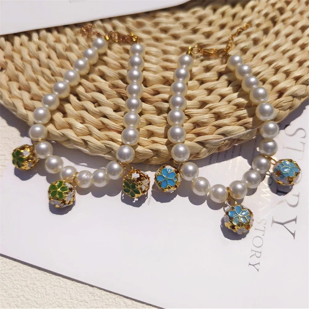 Collier de perles avec cloches - Pet Supplies York avis et prix