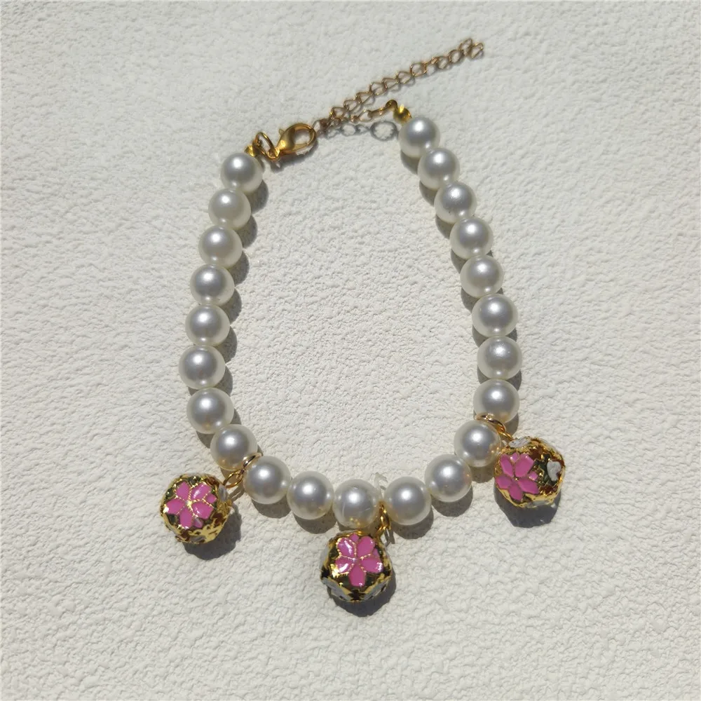Collier de perles avec cloches - Pet Supplies York avis et prix