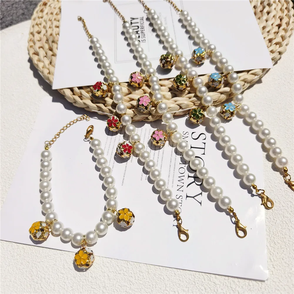 Collier de perles avec cloches - Pet Supplies York avis et prix